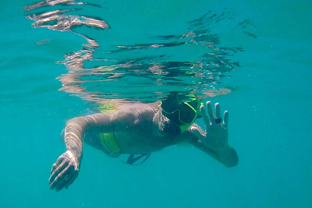waving while snorkeling